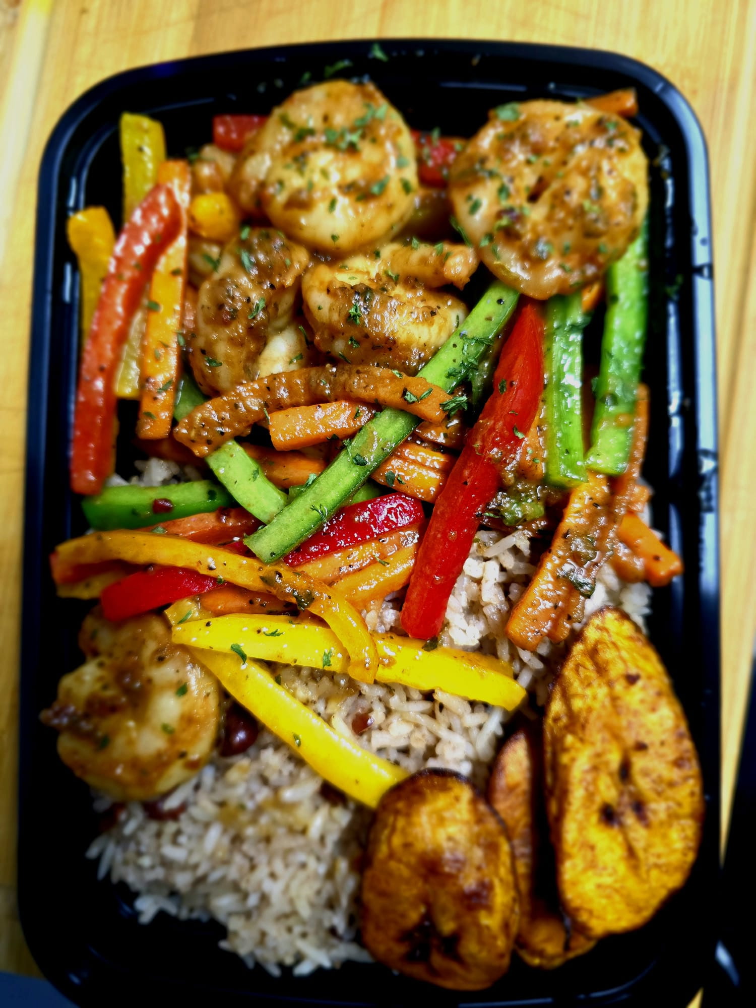 Garlic Butter Shrimp with rice and peas, and plantains