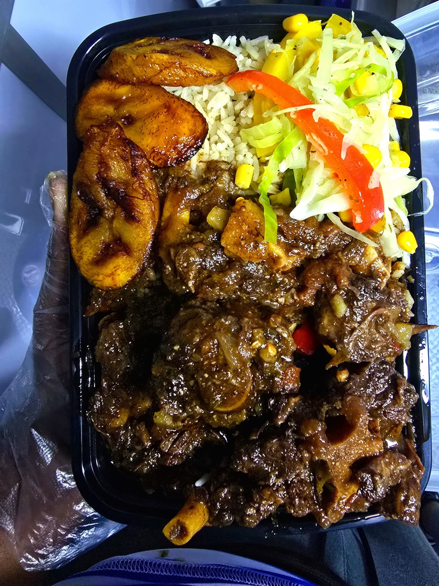 Oxtail with rice, peas, and plantains